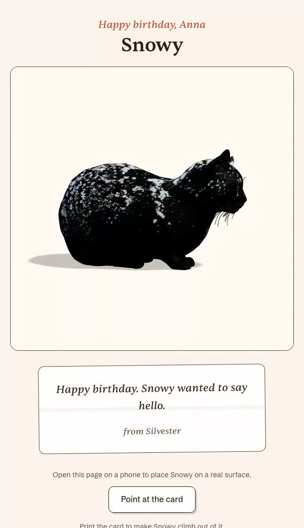 A phone screen: a wrapped parcel arrives, a ribbon is pulled aside, the paper tears open, and a lifelike 3D cat appears, turning slowly with a birthday message under it.